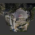 Ancient Circular Theater Ruins Surrounded by Trees and Rocky Archaeological Site