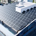 Green Surrounded High Rise Buildings With Solar Panels And Daily Electrical Appliances