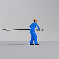 Man wearing blue work uniform and orange safety helmet holding green tool with black cable