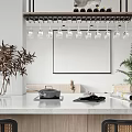 Modern Kitchen Interior With White Countertop Hanging Wine Glasses Plants Wooden Cabinets And Wall Frame