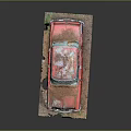 Rusty Old Red Car Model Displayed On Dirt And Grass Base
