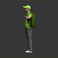 Man in Green T shirt Green Cap With Backpack Arms Outstretched on Gray Background