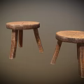 Two Rustic Wooden Stools With Round Seat Natural Wood Grain And Three Legs