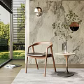 Modern Accent Chair With Wooden Frame Leather Seat Near Large Window Green View And Marble Wall