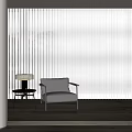 Vertical Blinds in Modern Living Space with Armchair Side Table and Wooden Floor