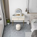 Elegant Vanity Table With Round Mirror Organized Drawers And Stool In Bedroom