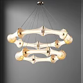 Three Tiered Bone Shaped White And Gold Chandelier Hanging In Gray Background Interior Decor