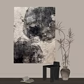 Abstract Wall Art in Neutral Living Room with Black Side Table and Tall Leafy Plant