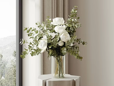 Transparent Glass Vase With White Flowers Green Leaves On White Table By Window Mountain View 3d model