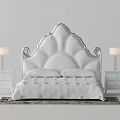 Elegant Double Bed With Scalloped White Headboard And Nightstands With Table Lamps