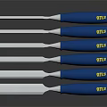 Set of Woodworking Chisels With Blue Handles And Yellow MTLS Labels