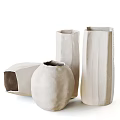 Handcrafted Ceramic Vessels With Textured Surfaces And Assorted Shapes For Home Decor