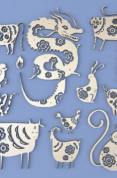 Decorative Wooden Animal Carvings With Intricate Floral Patterns Showcasing Diverse Shapes Like Cow Dragon Rabbit 3d model