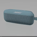 Bose Light Blue Portable Bluetooth Speaker With Hand Strap And Compact Design