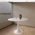 White Round Dining Table With Ceramic Vase And Book By Window Blinds On Wooden Floor 3d model