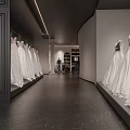 Modern Bridal Shop Interior With Arched Doorway Large Windows And Displayed Wedding Dresses