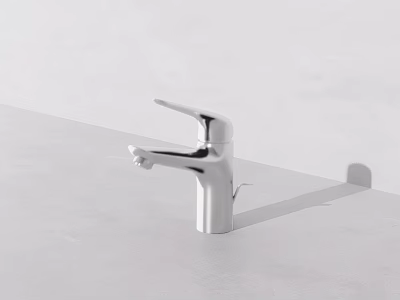 Modern Stainless Steel Faucet With Single Handle On White Bathroom Countertop 3d model