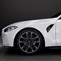 White Station Wagon Car With Sleek Modern Design And Black Alloy Wheels
