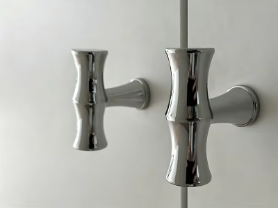 Chrome Cabinet Handles With Modern Sleek Curved Design On White Panel 3d model