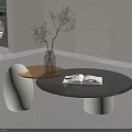 Modern Living Room Coffee Table With Round Dark Top White Base Open Magazine And Plant Vase