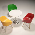 Modern Table and Chair Set With White Round Top Red Yellow Green Chairs Wooden Legs