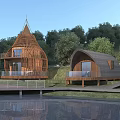 Two Unique Wooden Houses With Pointed And Curved Roofs Terrace Near Lake Surrounded By Trees