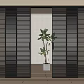 Modern Black Sliding Doors With Vertical Stripes And Indoor Green Plant View