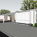 Modern Entrance Gate Architectural Design With White Walls Metal Frames Stone Paved Ground And Greenery