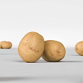 Fresh Brown Potatoes Scattered on White Surface with Natural Skin Texture