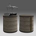 Woven Design Side Tables in Neutral Tone with Silver Horse Figurine and Stack of Books