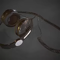 Black Over Ear Headphones With Coiled Cable For High Quality Audio Experience