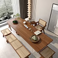Wooden Tea Table and Chairs with Rattan Seats Tea Sets and Potted Plant in Natural Light