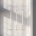 Modern Linear Chandelier With Three Suspended Light Bars And Metal Frame For Contemporary Interior Spaces