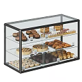 Glass Display Case With Assorted Desserts Including Chocolate Cakes Pies And Croissants
