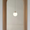 Modern Minimalist Pendant Light Featuring White Globe Shade And Gold Accent In Wooden Archway Interior