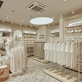 Bright Shopping Mall Clothing Store With White T Shirts Lingerie Display Racks And Mannequin
