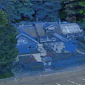 Detached Villa In Wooded Surroundings With Gray Roof Blue Exterior And Front Garden Parking