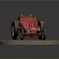 Vintage Car with Orange Barrel Body Red Striped Seat Large Black Wheels on Circular Stand