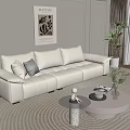 White Modern Multi Person Sofa With Cushions Living Room Coffee Table And Green Plant