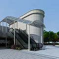 Modern Building Escalator With Glass Canopy Stone Wall Plaza And Surrounding Trees
