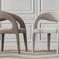 Modern Leisure Chairs With Curved Armrests And Upholstered Seats In Neutral Tones