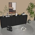 Modern Black Entryway Cabinet Sideboard With Green Plants Vases Fruit Bowl And Artwork