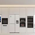 Modern White Kitchen With Built In Appliances Including Refrigerator Ovens And Microwave