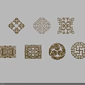 Traditional Carved Sculptures With Various Shapes And Decorative Patterns On White Background