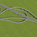 Modern Curved Interchange Bridge With Green Grass Landscape And Multiple Curved Lanes