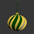 Shiny Green And Gold Striped Christmas Ornament With Hanger On Black Surface