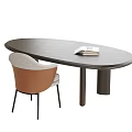 Modern Oval Wooden Desk With Open Book And Light Gray Brown Chair