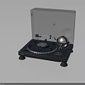 Modern Vinyl Turntable With Transparent Cover And Metallic Tonearm On Dark Base