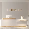 Modern Elegant White Reception Desk With Computer Sculpture Gold Lettering And Potted Plant