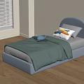 Light Blue Arched Headboard Kids Bed with Green Quilt and Colorful Pillow